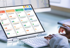 Laptop with project management software on