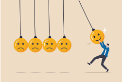 Illustrated man swinging a happy face into a series of sad faces